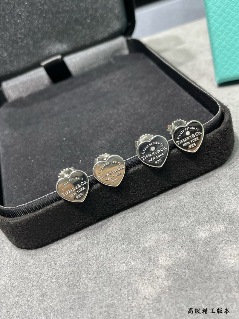 T*f*ny earrings